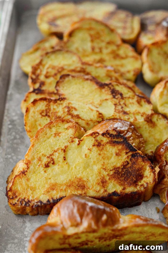 Sourdough French Toast with Berry Compote 20 Keeping cooked Buttermilk French Toast warm in a low oven on a sheet pan
