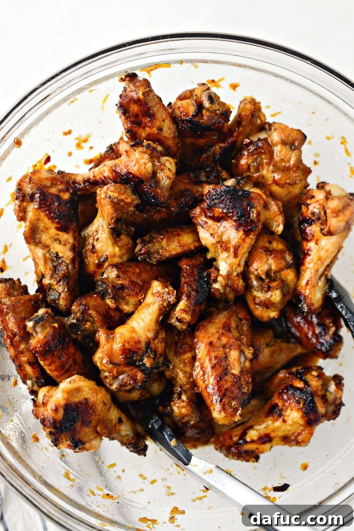 add wings to bowl with remaining glaze