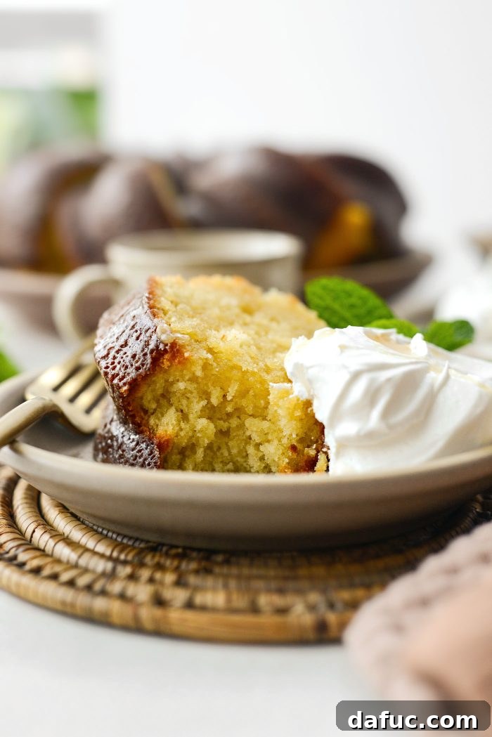 Golden Butter Drenched Cake 3 Sliced Kentucky Butter Cake showing its moist interior and glaze