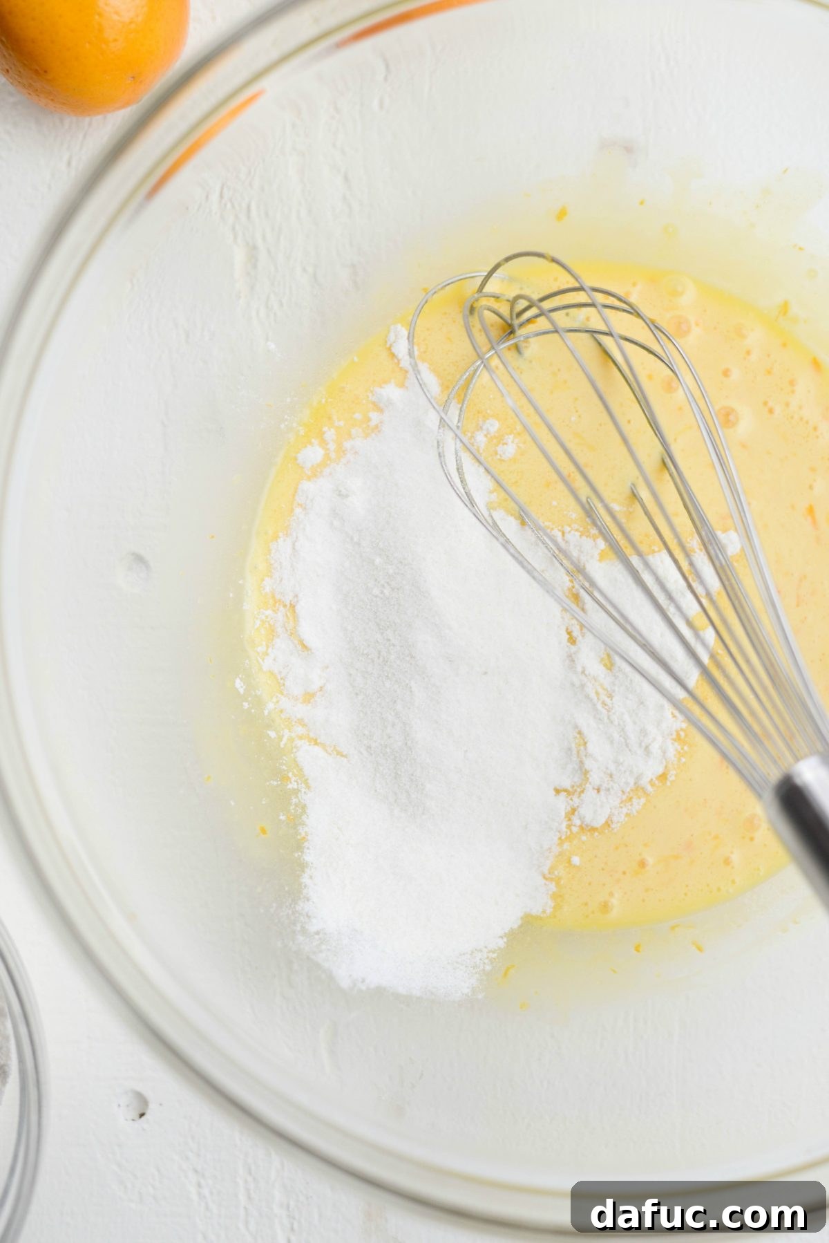 Adding dry ingredients to wet mixture