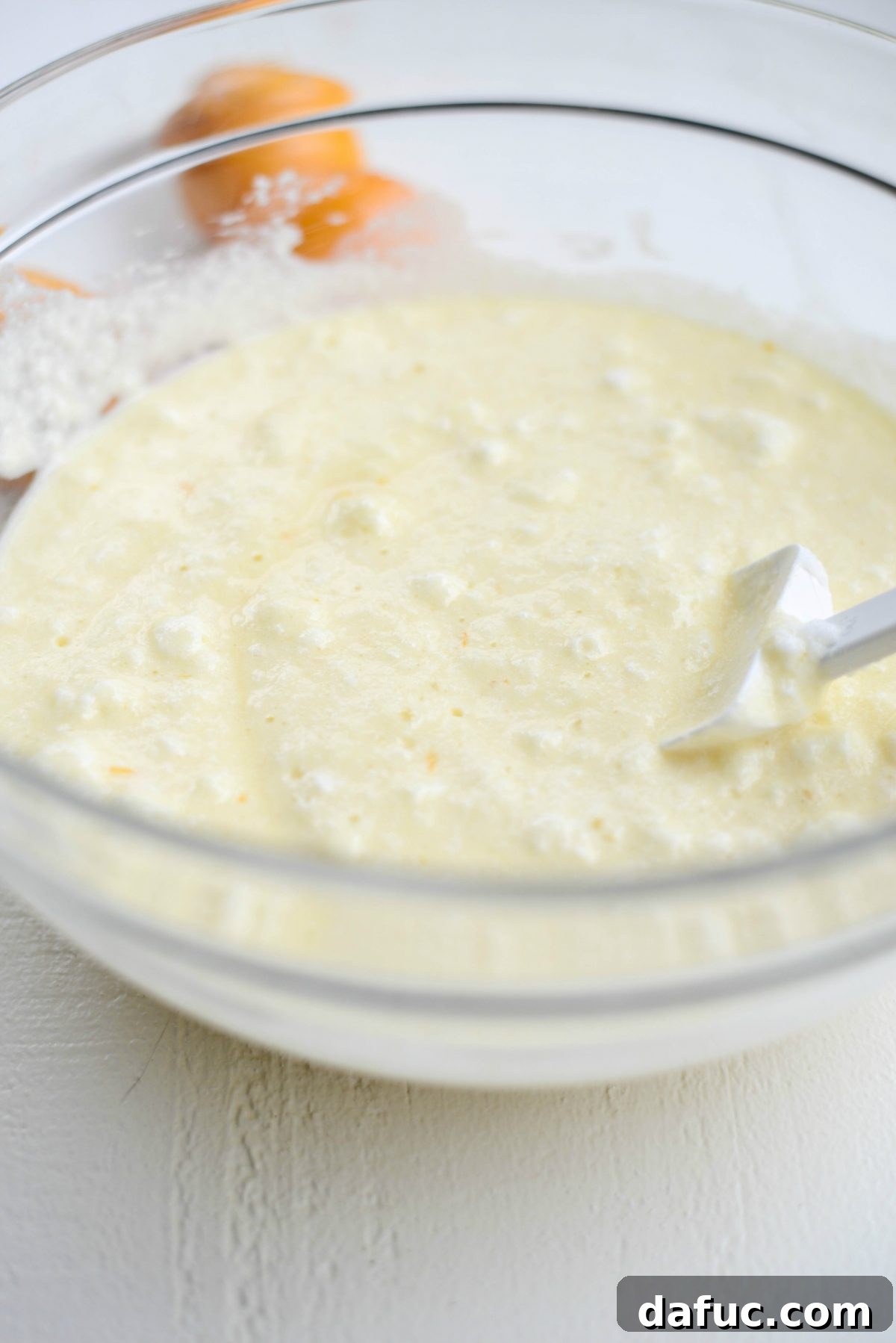 Folding in whipped egg whites gently