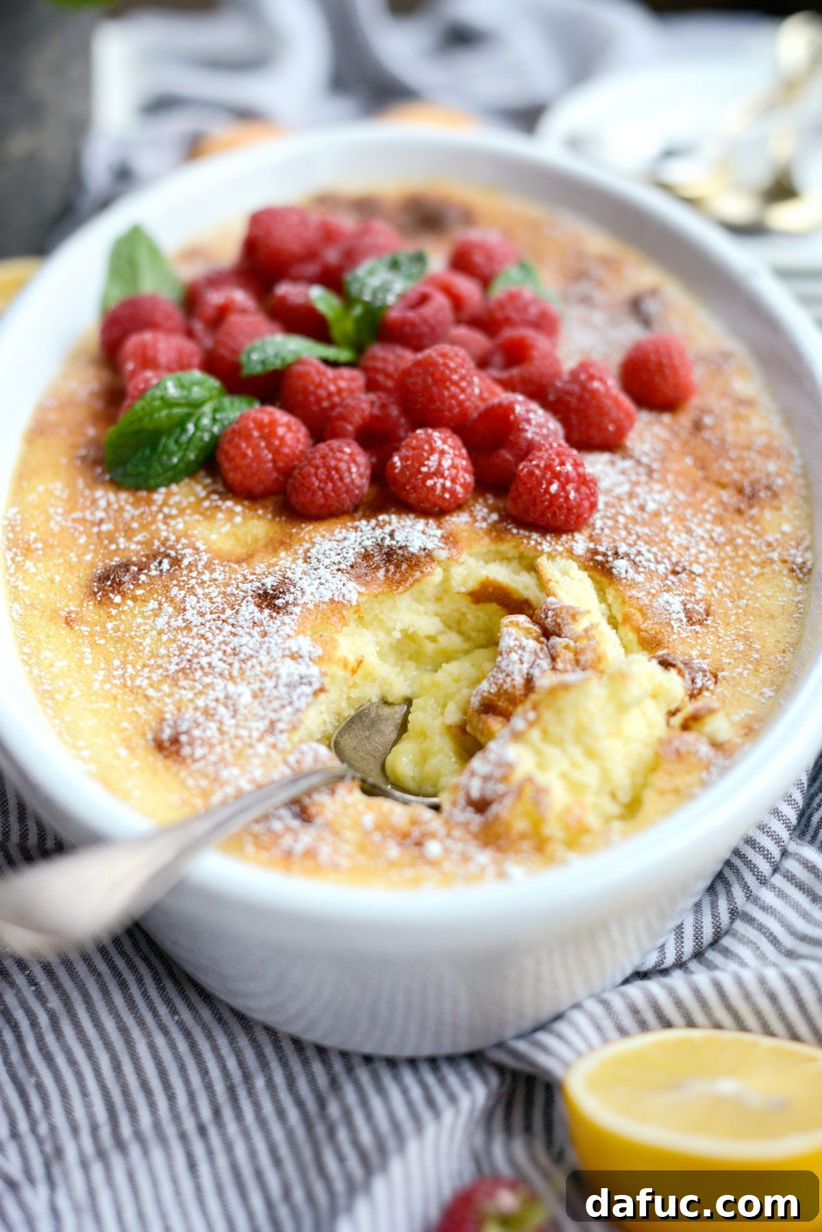 Close up of a spoonful of Meyer Lemon Pudding Cake