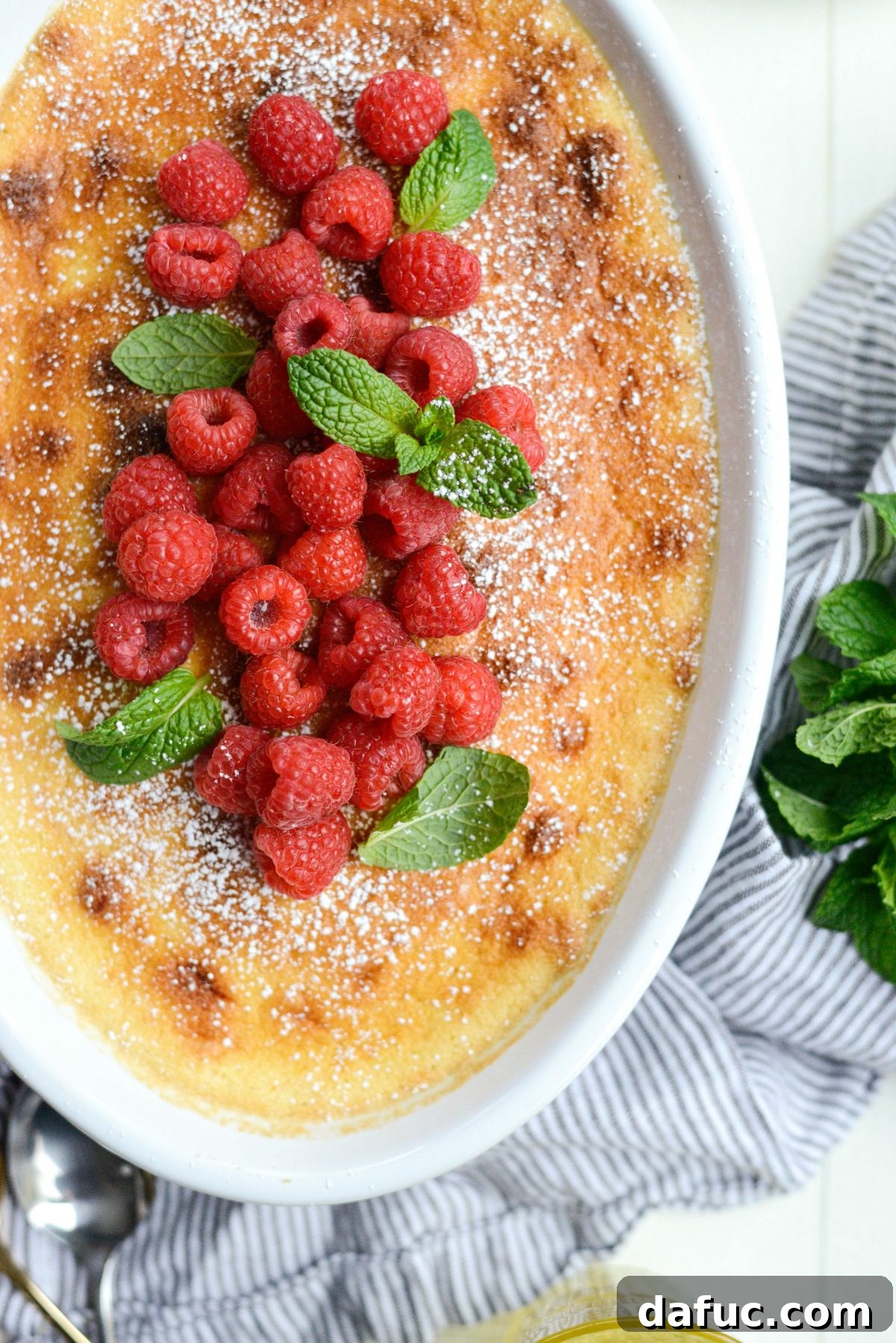 Meyer Lemon Pudding Cake on a white plate