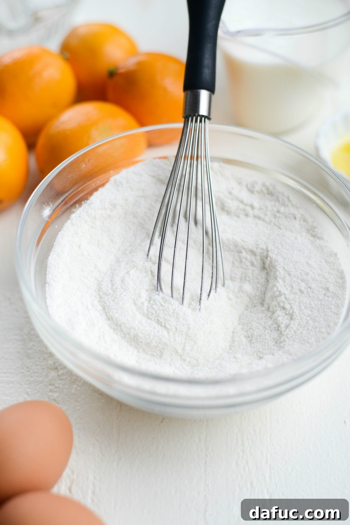 Whisking dry ingredients in a bowl