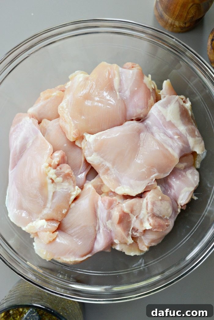 boneless skinless chicken thighs in bowl