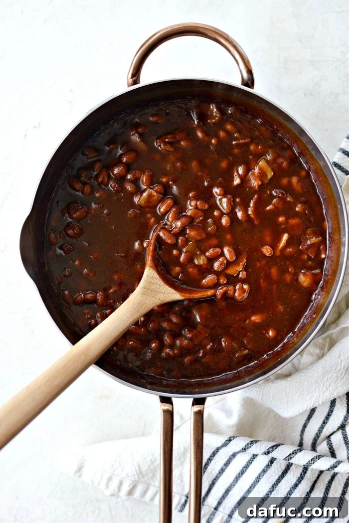 Hearty Homestyle Baked Beans 3 Close-up of Homemade Baked Beans simmering in a pot