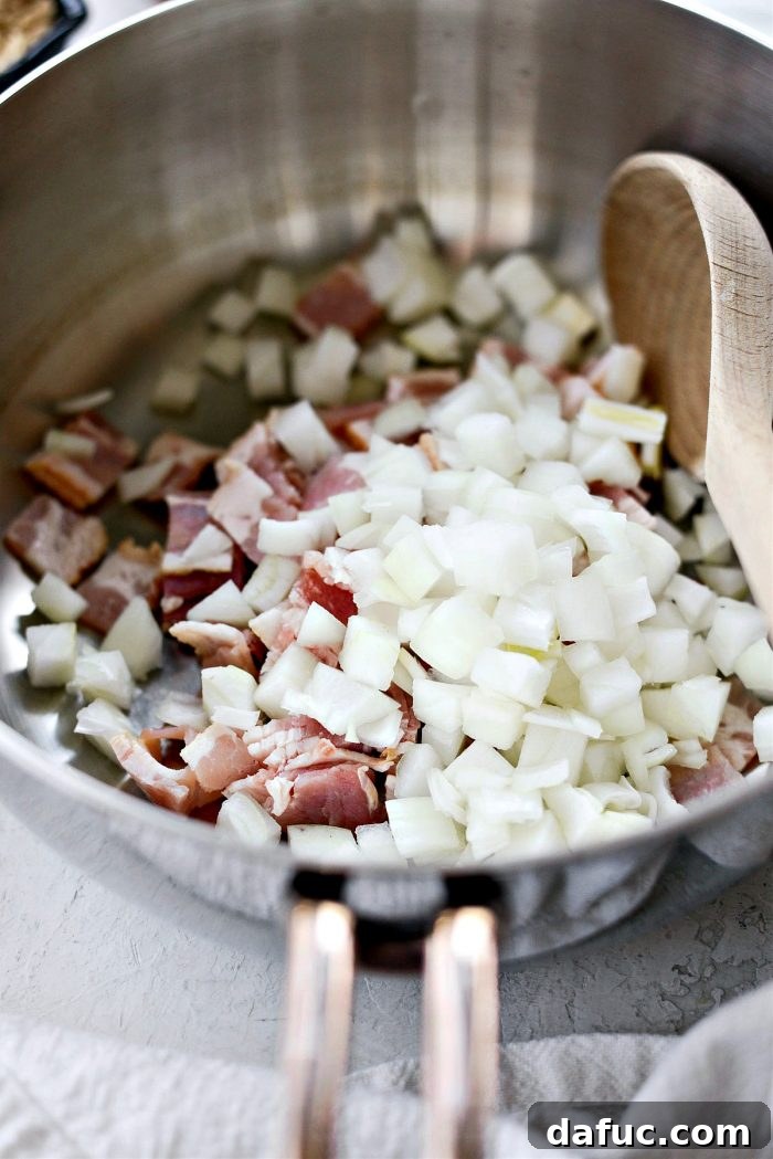 Hearty Homestyle Baked Beans 5 Diced onion and bacon being sautéed in a dutch oven