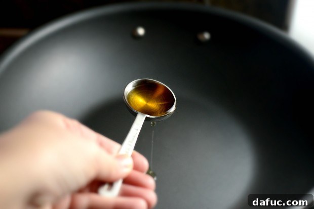 Toasted sesame oil in a wok