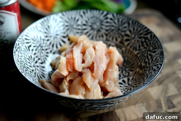 Marinating chicken in a bowl