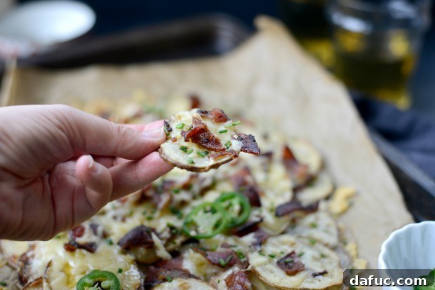 A beautiful wide shot of a full tray of homemade Irish Nachos, perfectly garnished and ready to be enjoyed.