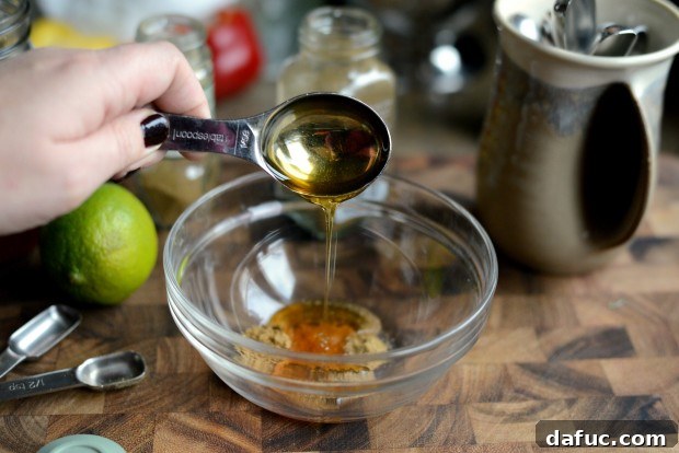Zesty Cumin Lime Mexican Slaw 11 Adding honey and lime juice to the spices for the dressing
