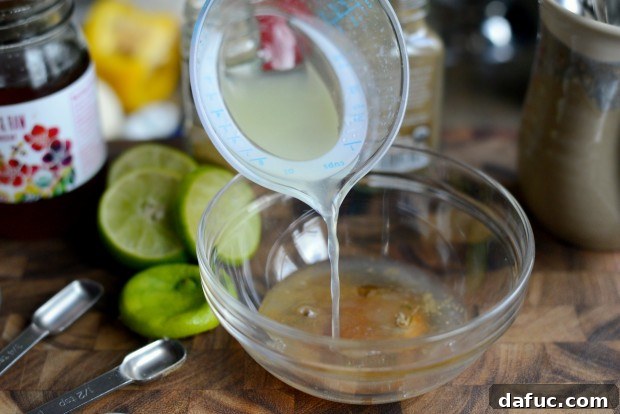 Zesty Cumin Lime Mexican Slaw 12 Whisking olive oil into the lime and honey mixture