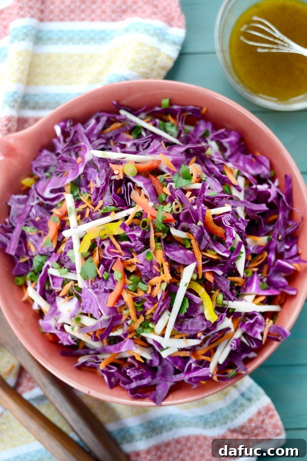 Zesty Cumin Lime Mexican Slaw 16 Mexican Slaw with cumin lime dressing in a serving bowl