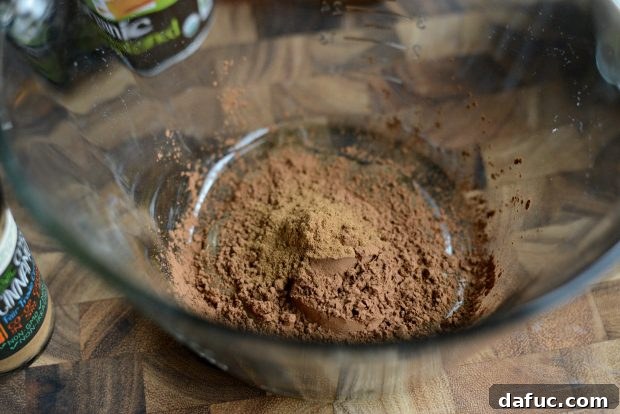 Cool Cocoa Bliss 11 Adding ground cinnamon to the mixture
