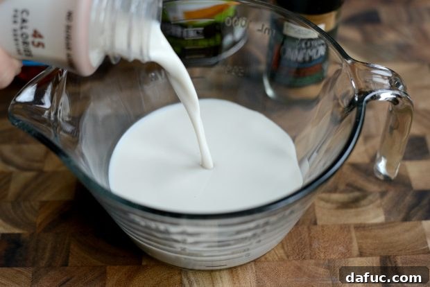 Cool Cocoa Bliss 8 Pouring unsweetened coconut almond milk for the recipe