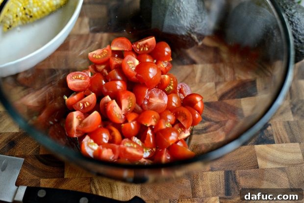 Cherry tomatoes quartered for Avocado Corn Salsa