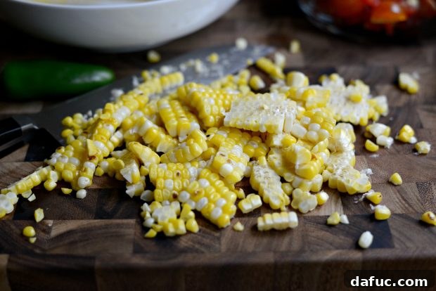 Grilled corn kernels sliced off the cob for salsa