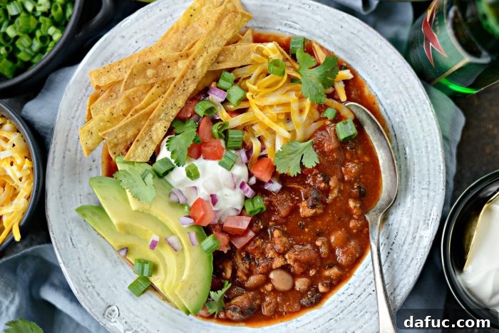 Turkey Taco Beer Chili with abundant toppings