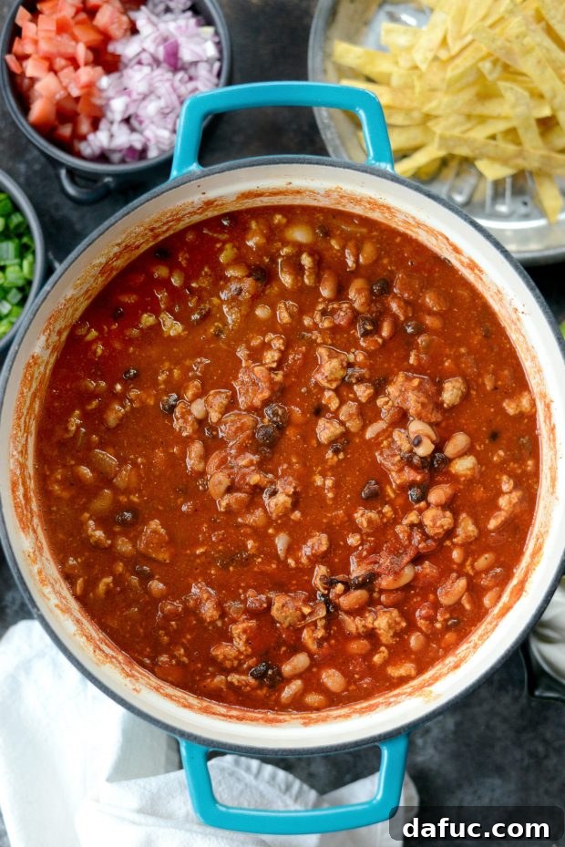 Simmering Turkey Taco Beer Chili in a Dutch oven