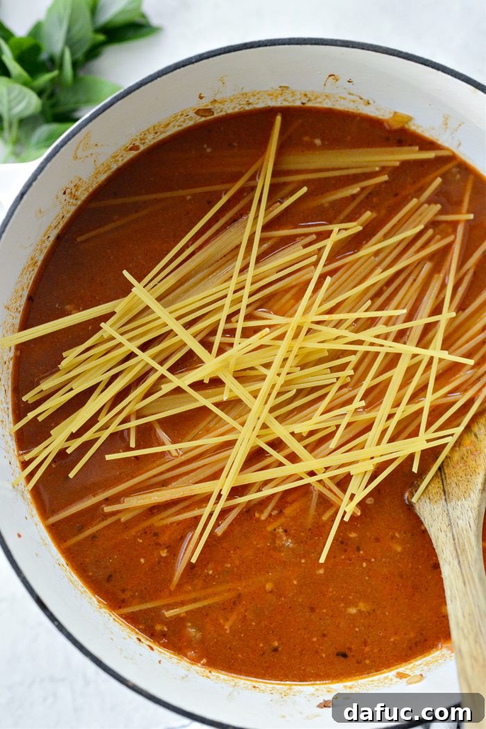 Effortless One-Pan Spaghetti 12 break spaghetti noodles in half and add to pot