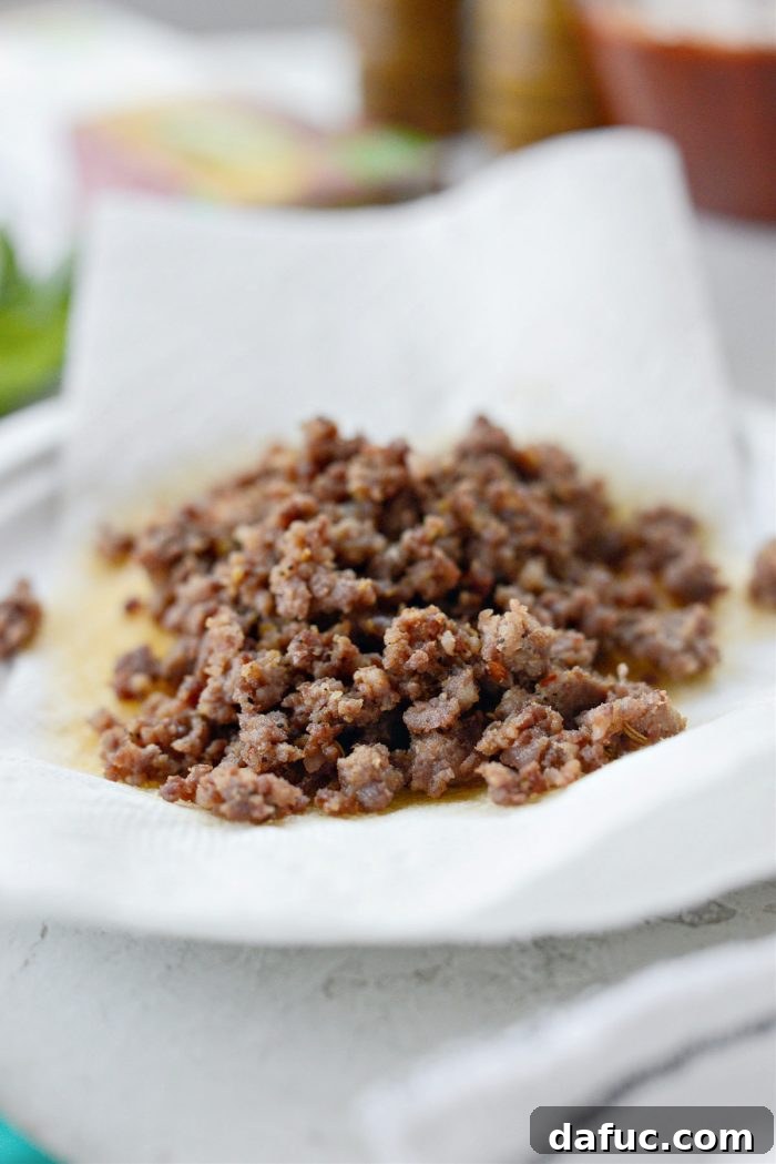 Effortless One-Pan Spaghetti 7 browned italian sausage on paper towel lined plate