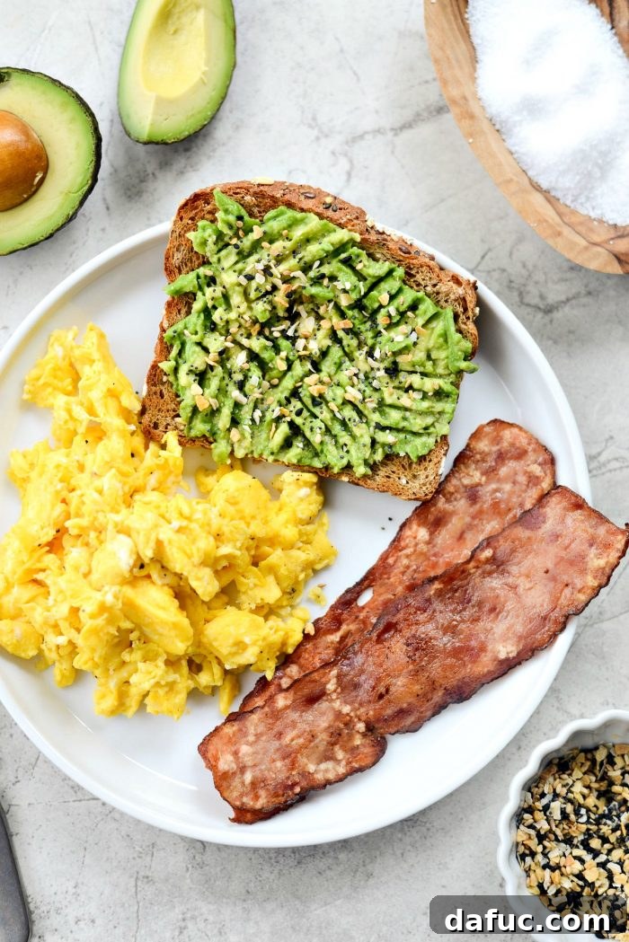Kitchen's Secret Weapon 3 Everything Bagel Seasoning sprinkled generously on avocado toast with a perfectly fried egg