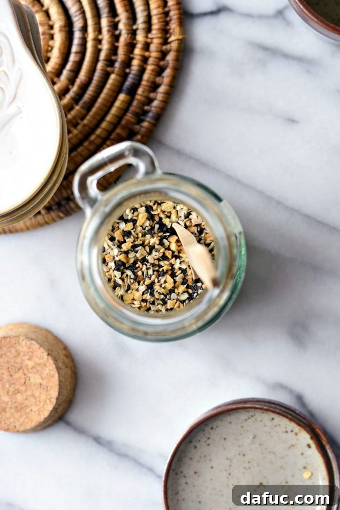 Kitchen's Secret Weapon 6 Measuring the ingredients for Everything Bagel Seasoning into a jar