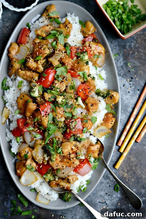 Zesty Ginger Sesame Chicken Stir-Fry 3 Close-up of ginger sesame chicken stir-fry with vibrant vegetables