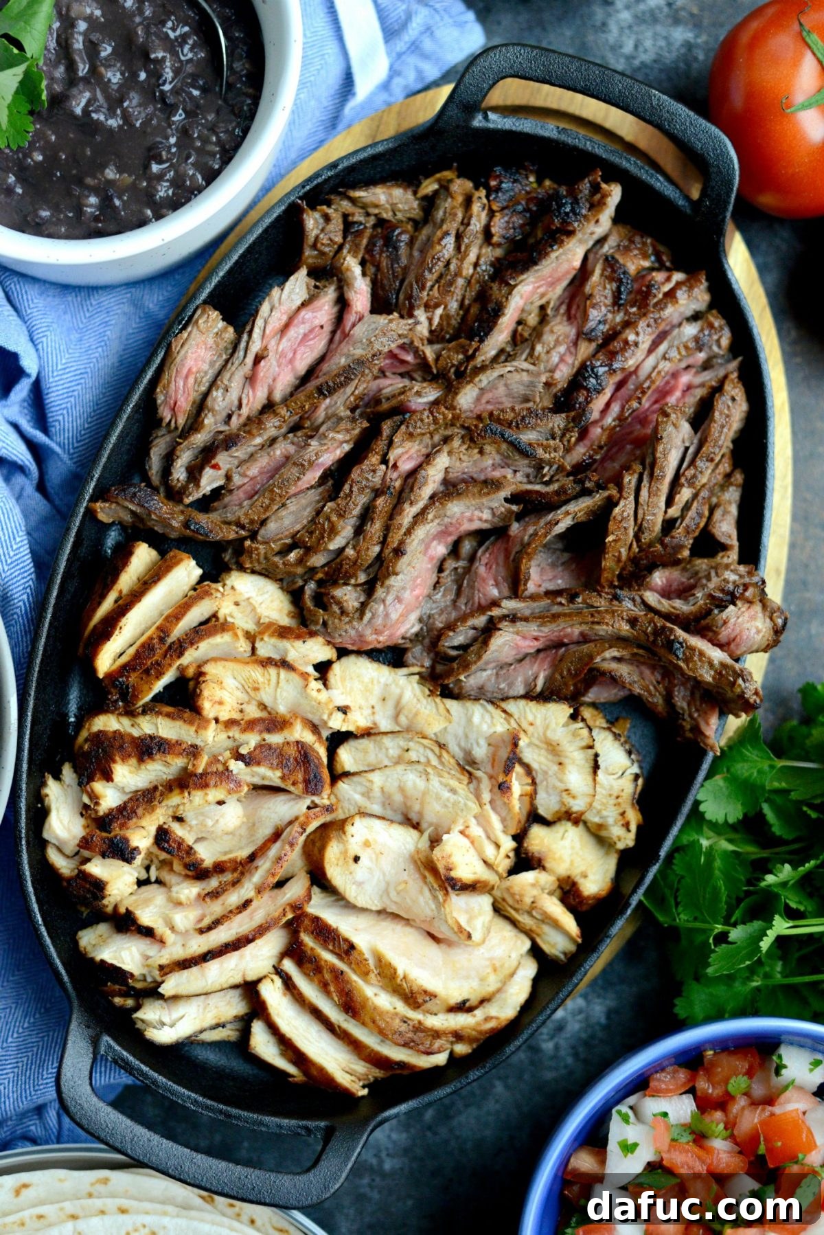 Resting cooked steak and chicken before slicing and serving