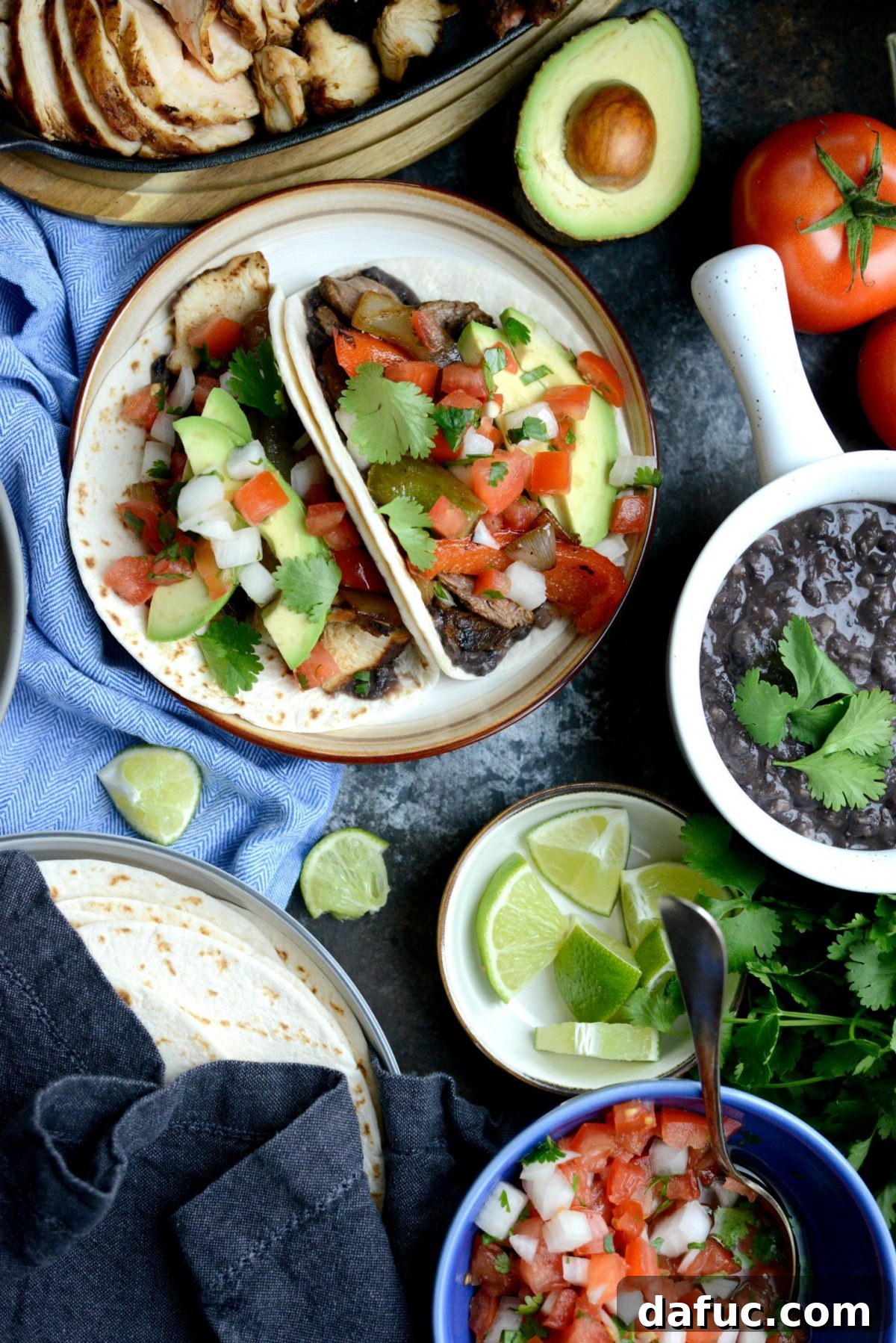 Assembled Skillet Frajitas with a variety of toppings