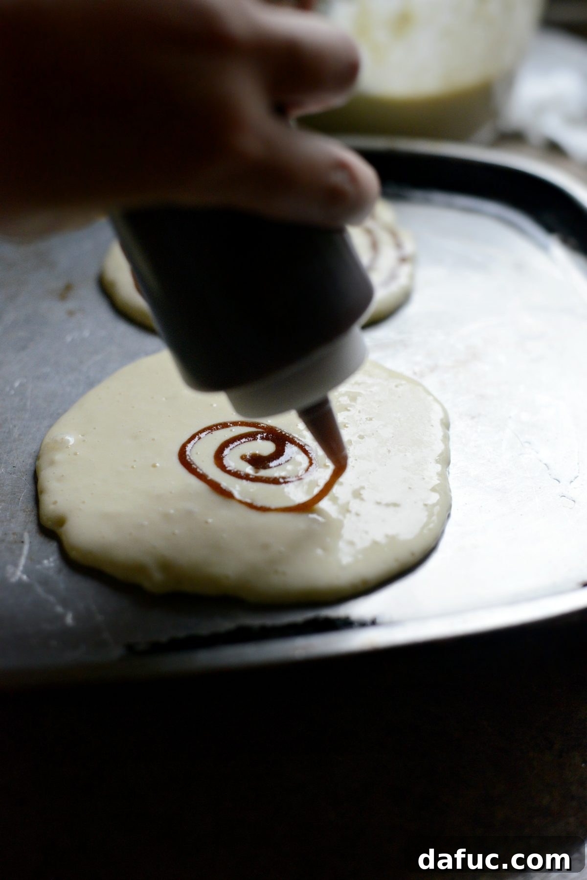 Dreamy Cinnamon Swirl Stacks 13 Swirling the brown sugar butter mixture over the pancake