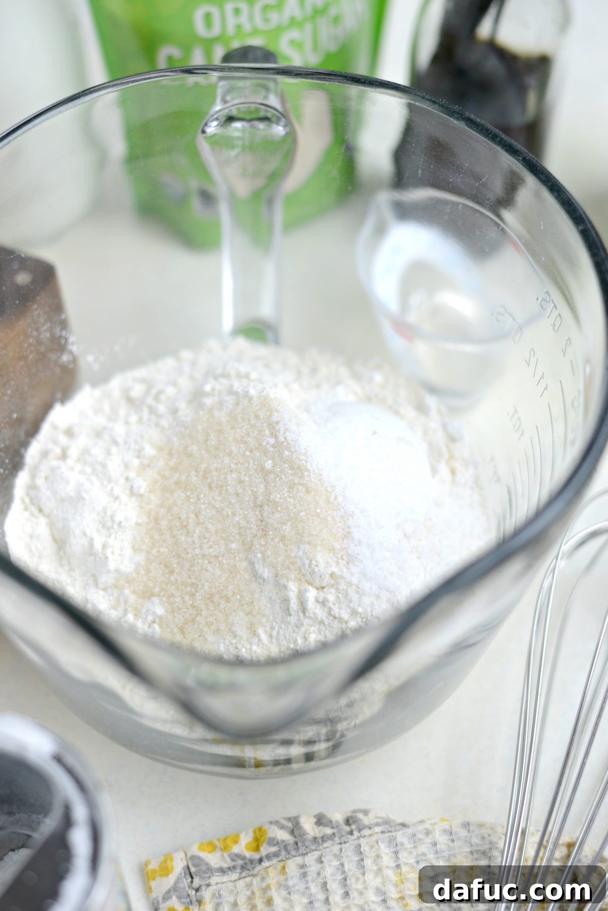 Dreamy Cinnamon Swirl Stacks 5 Dry ingredients in a mixing bowl with a spout