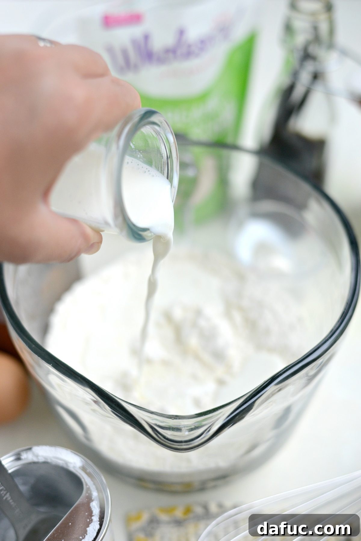 Dreamy Cinnamon Swirl Stacks 7 Adding milk to the dry ingredients