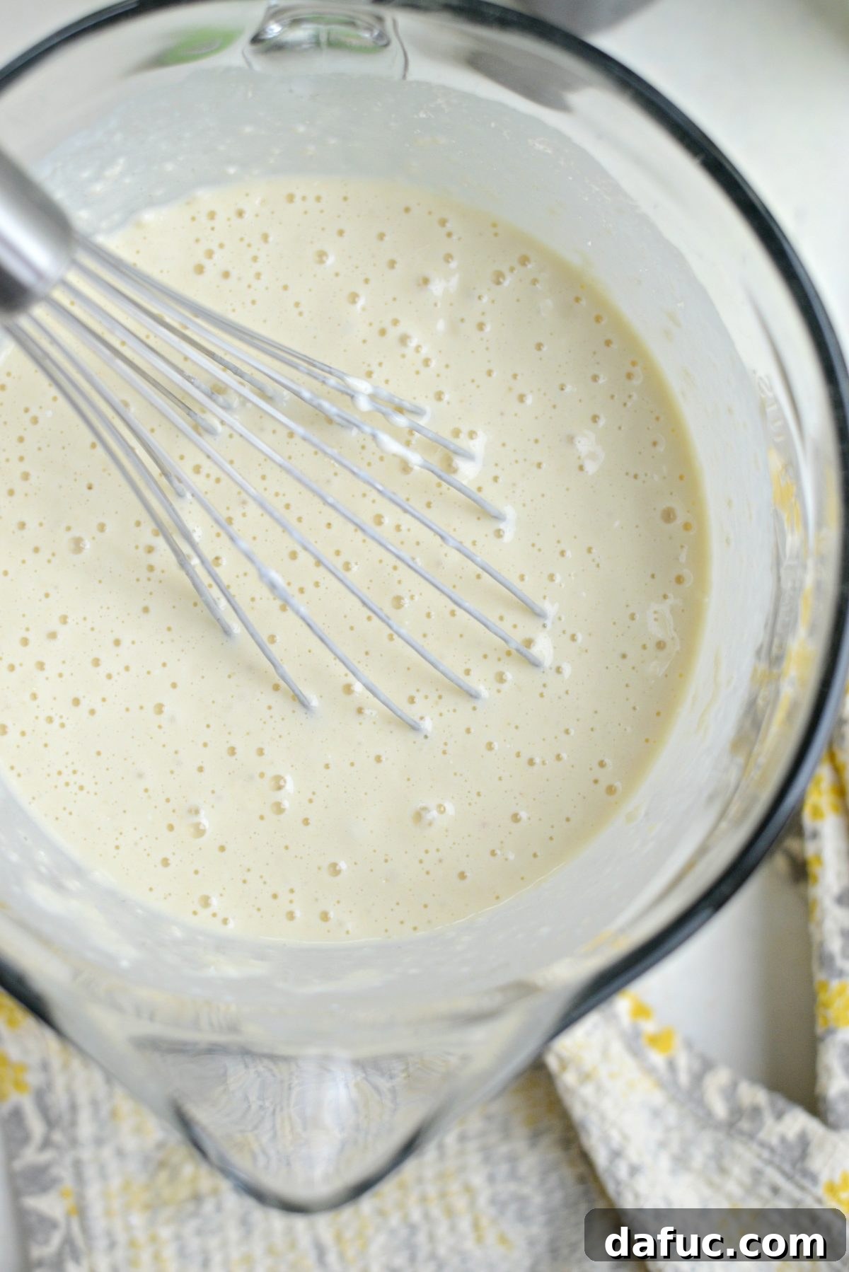 Dreamy Cinnamon Swirl Stacks 9 Whisking wet ingredients into dry