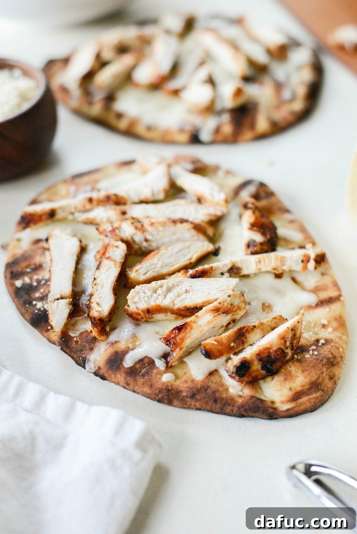 Zesty Grilled Caesar Chicken Pizza 7 Top with sliced grilled chicken