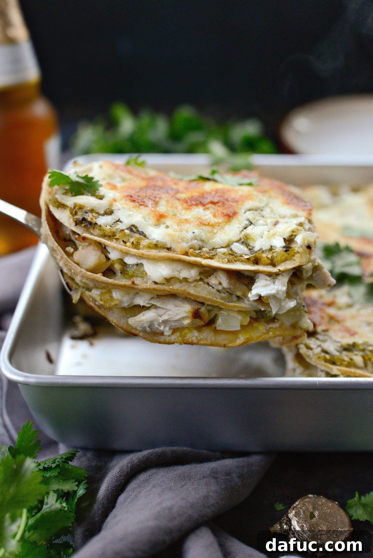 Green Chile Chicken Tortilla Bake 3 Close-up of baked Salsa Verde Chicken Tortilla Casserole