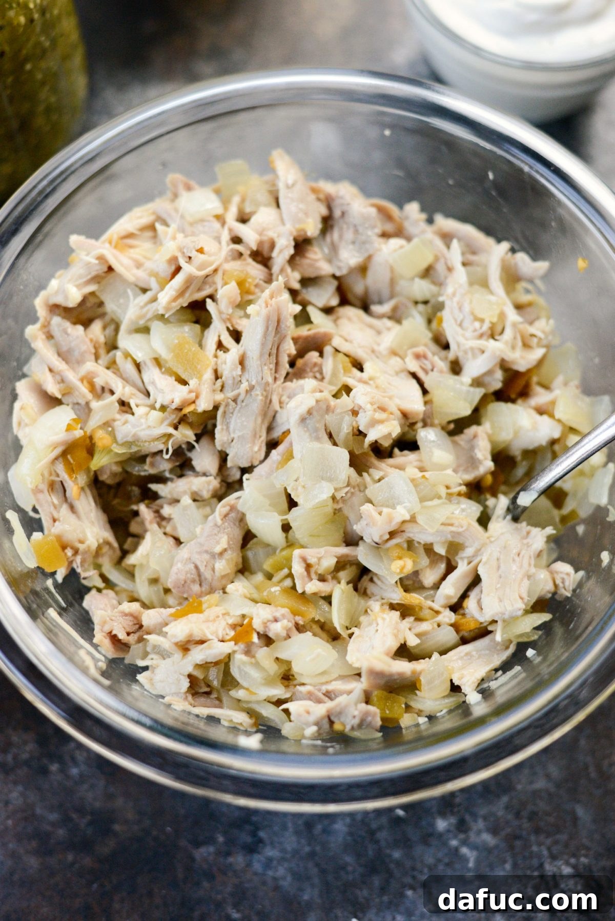 Green Chile Chicken Tortilla Bake 6 Shredded chicken mixture with sautéed onions, garlic, and green chiles