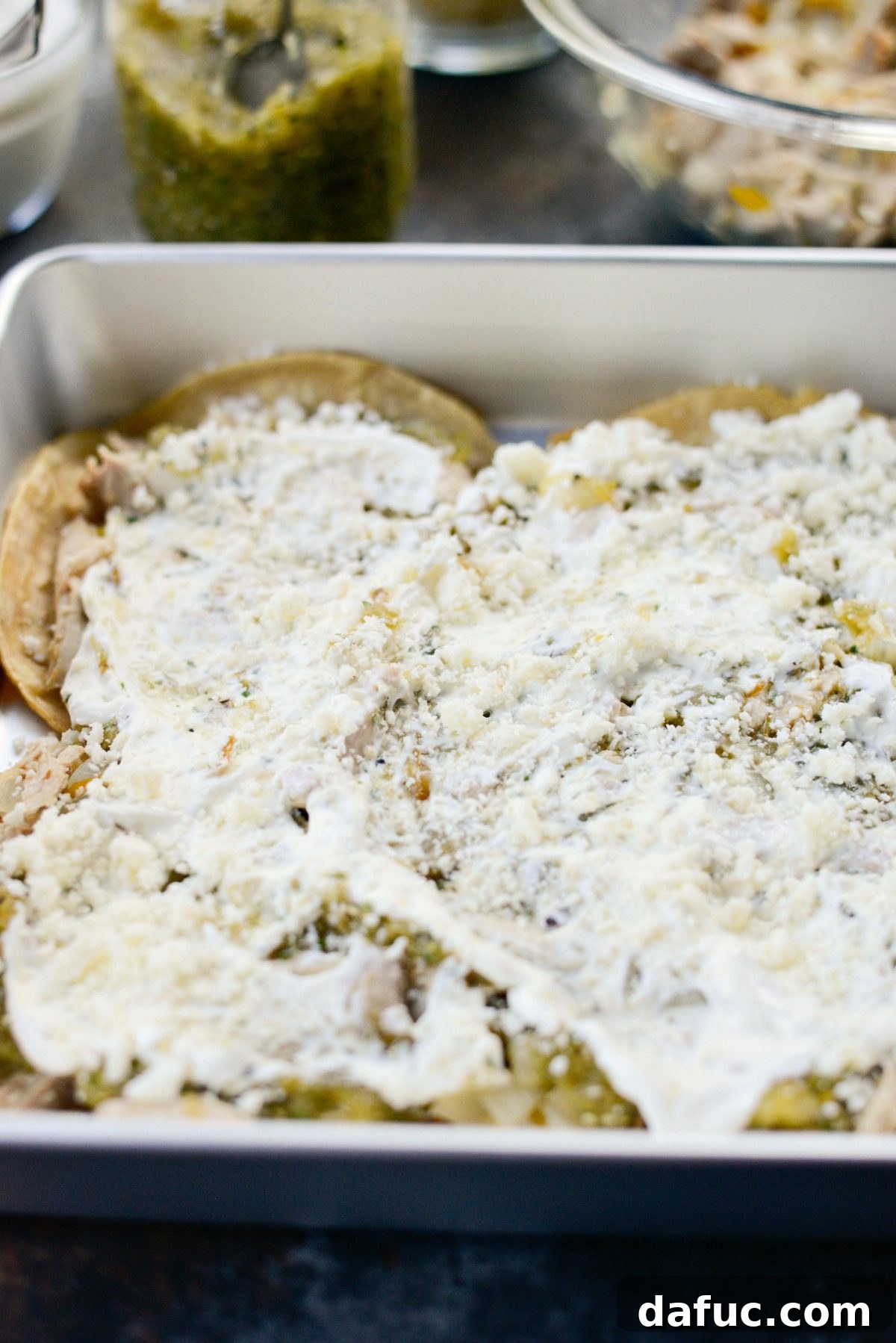 Green Chile Chicken Tortilla Bake 10 Sour cream, cotija, and Monterey Jack cheese layered over salsa verde