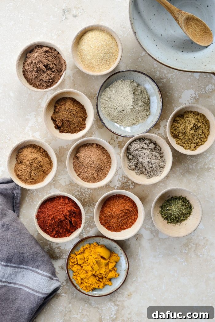 DIY Shawarma Spice Mix 4 Assorted whole and ground spices laid out, ready for making shawarma seasoning