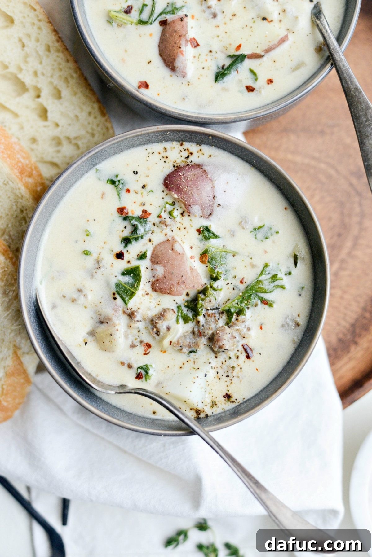 Creamy Potato, Sausage and Kale Soup - A hearty and comforting one-pot meal for cold weather.