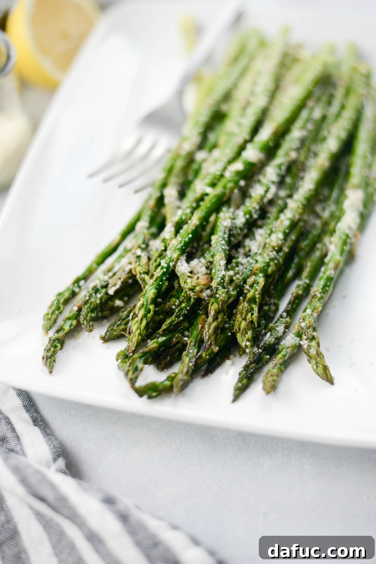 Zesty Garlic Parmesan Asparagus Roast 3 Close-up of Garlicky Lemon Parmesan Roasted Asparagus spears