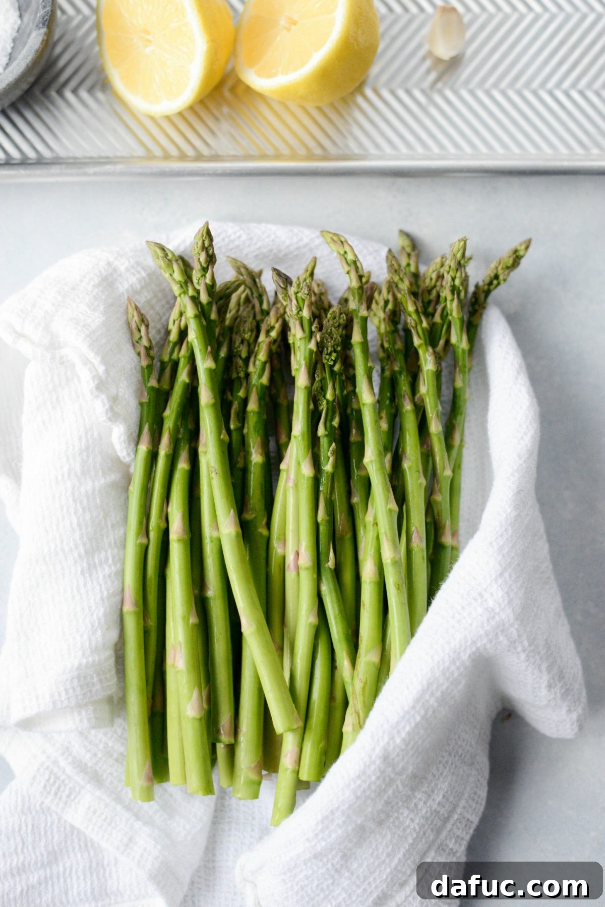 Zesty Garlic Parmesan Asparagus Roast 6 Washing and patting dry asparagus