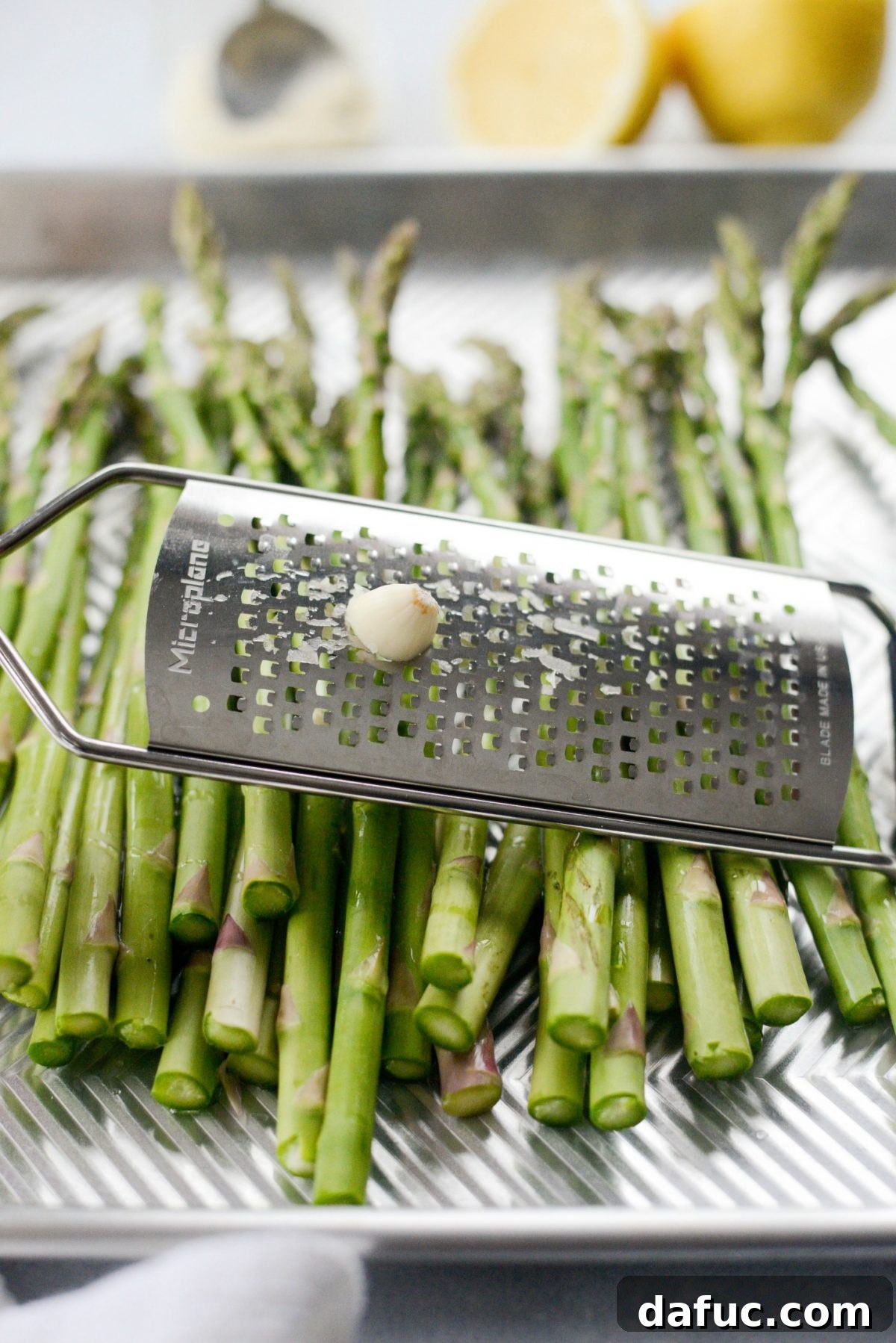 Zesty Garlic Parmesan Asparagus Roast 8 Grate garlic over asparagus