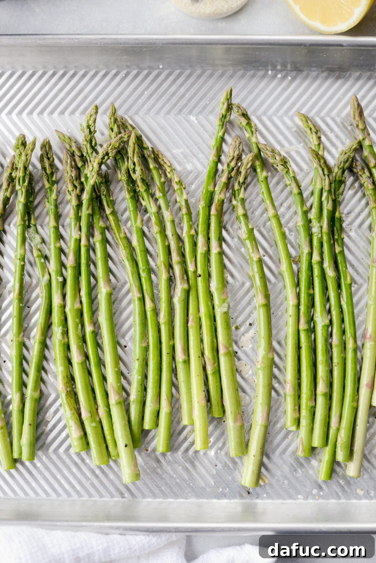 Zesty Garlic Parmesan Asparagus Roast 9 Toss asparagus with hands to coat