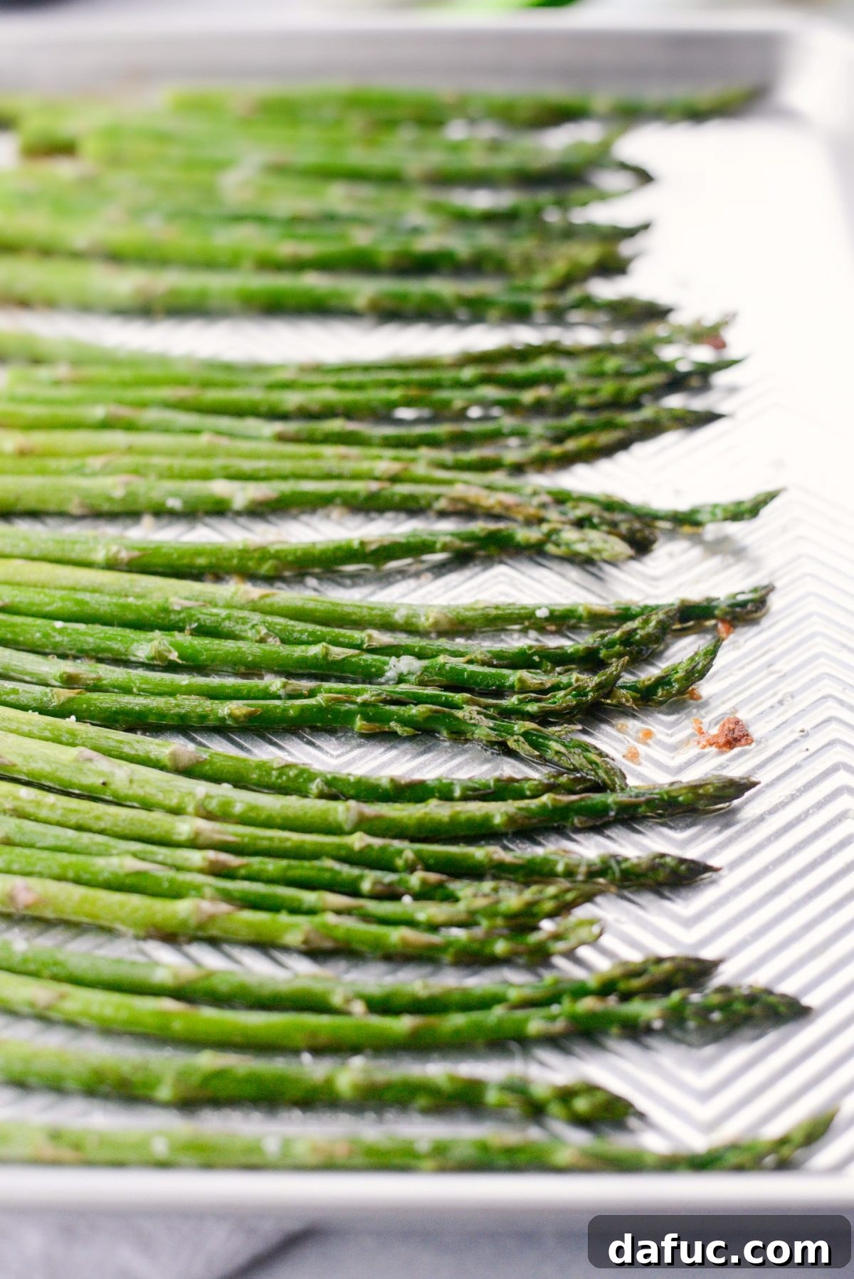 Zesty Garlic Parmesan Asparagus Roast 10 Asparagus roasting in the oven