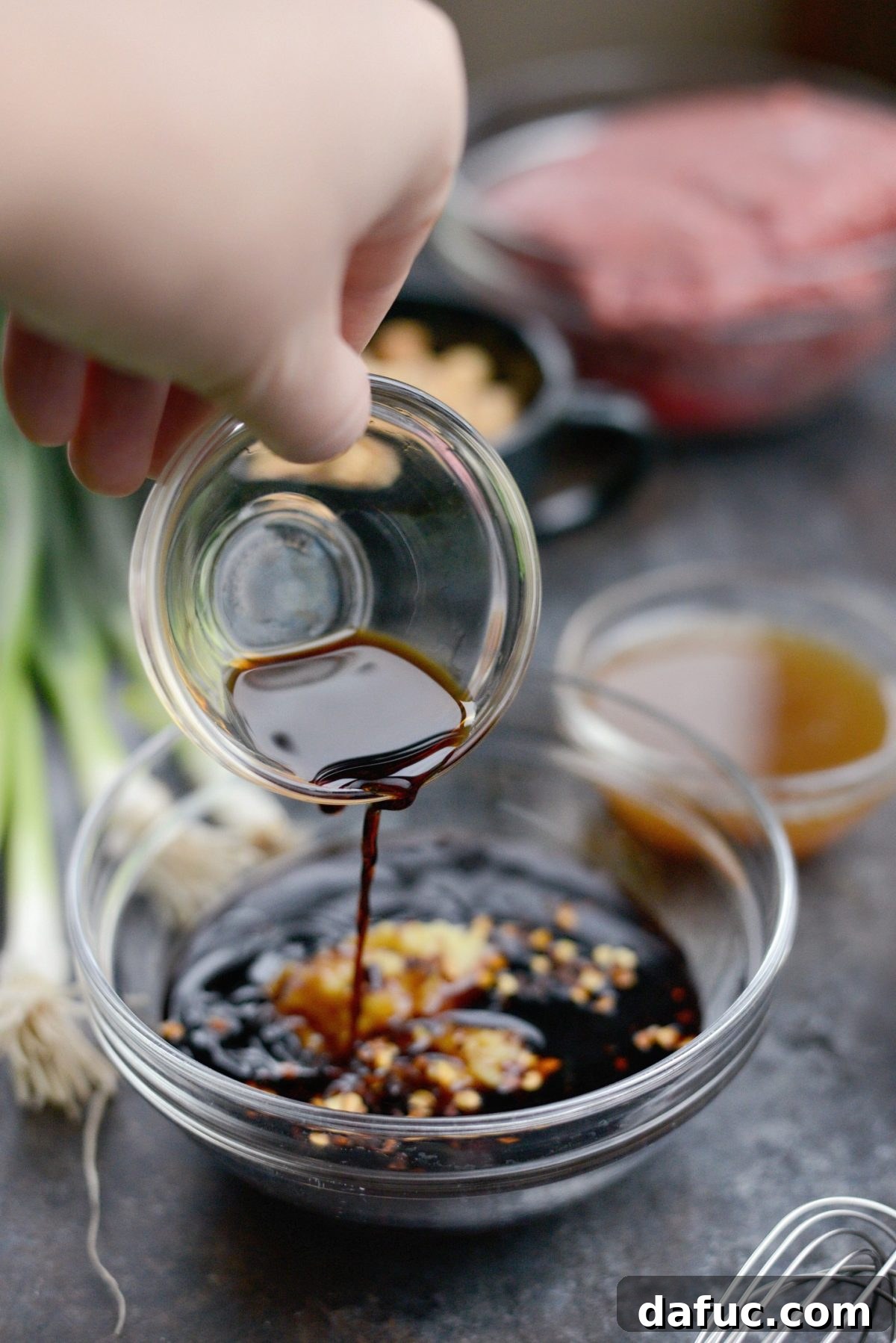 Preparing the savory ginger hoisin sauce for the beef wraps.
