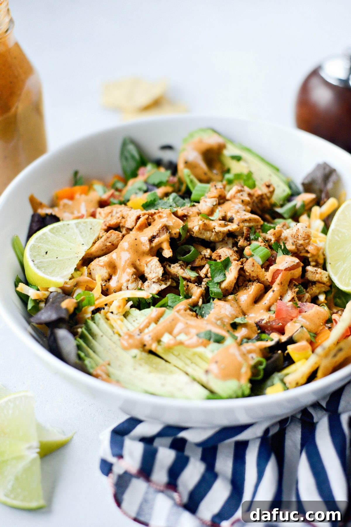 A final close-up of a jar of Homemade Southwest Dressing, inviting and delicious