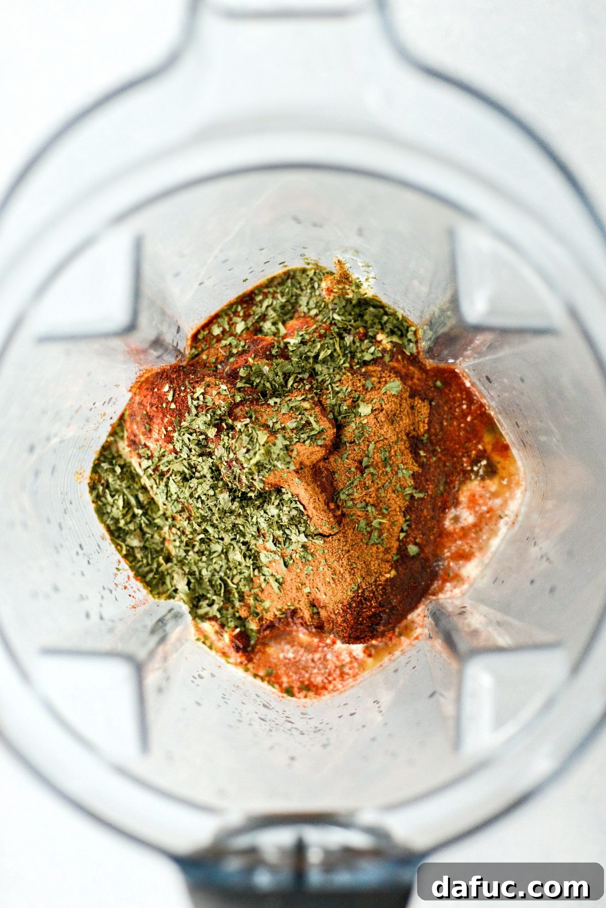All measured ingredients for homemade southwest dressing in a blender