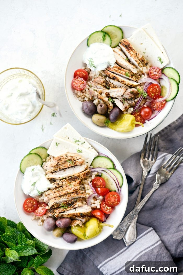 Multiple Greek Chicken Couscous Bowls served in different settings