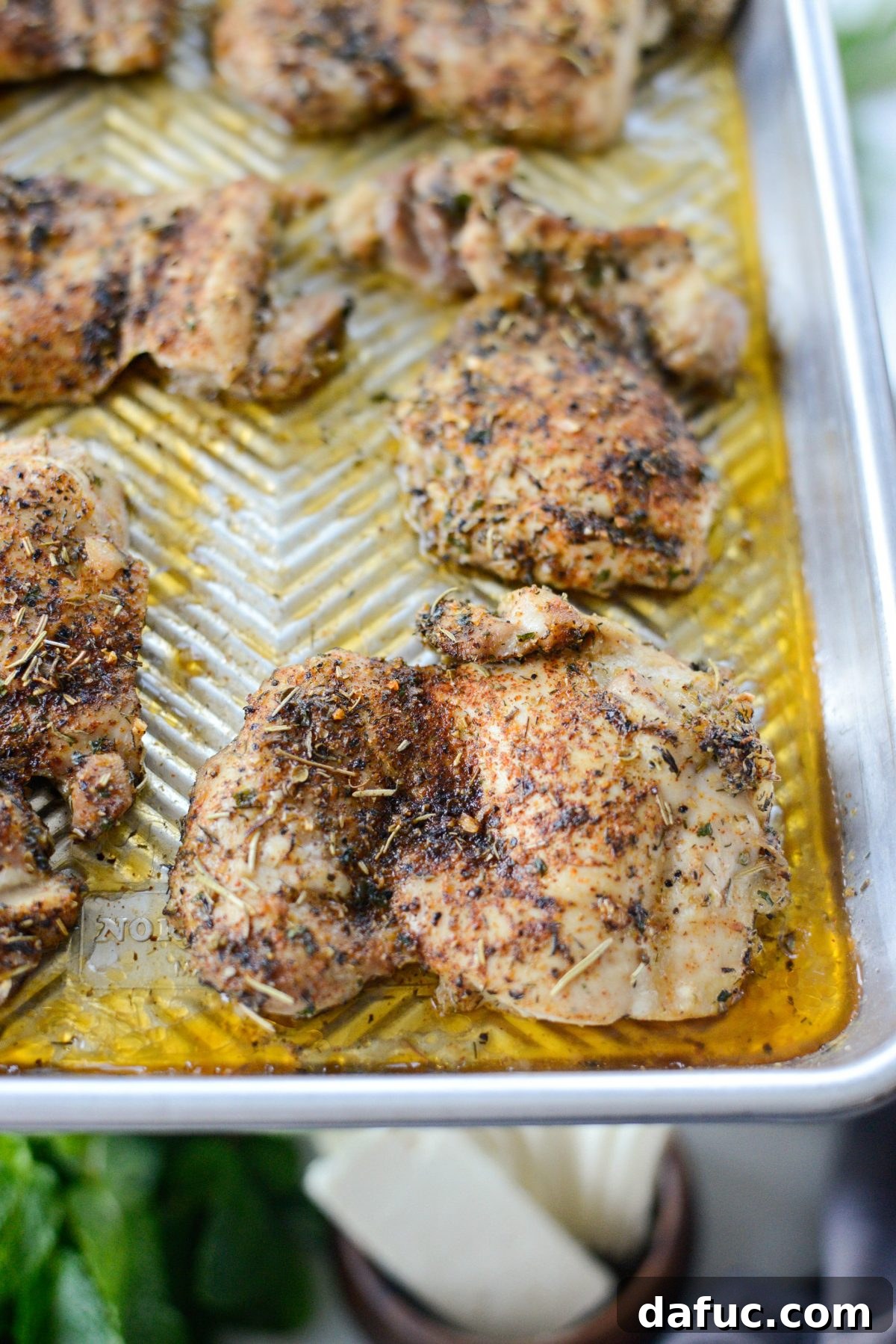 Vibrant Greek Chicken Couscous Bowl 7 Close up of baked Greek seasoned chicken thighs